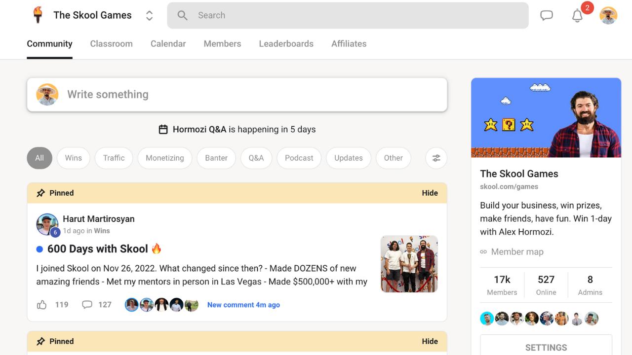 The Skool Games community feed with pinned member wins