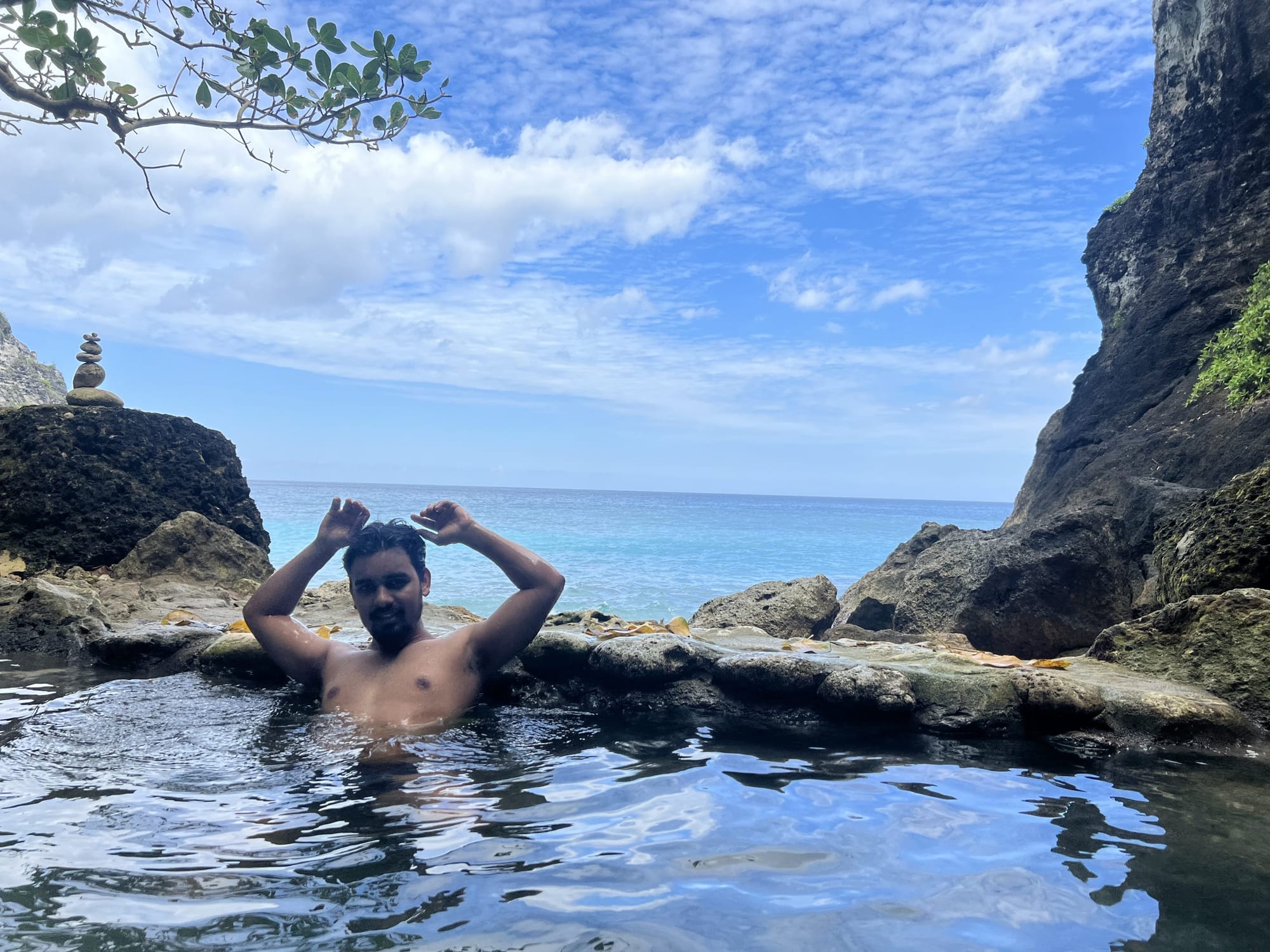 Himanshu Bisht at a nature spring in Indonesia